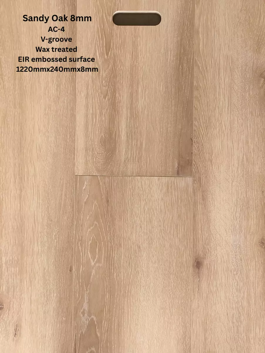 Sandy Oak laminate flooring sample board showing warm light oak wood grain